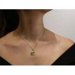 Photo of worn Praying Holy Mary medal