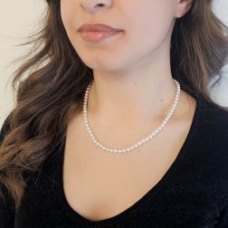 Photo of worn Fresh Water 5mm Pearl Necklace with White Gold and Diamond Drop Clasp