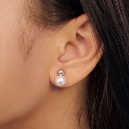Photo of worn 5mm Sphere Earrings in White Gold and 7.5mm Fresh Water Pearl