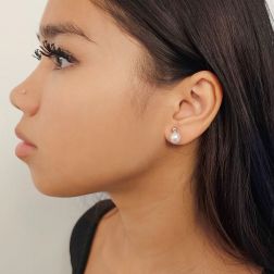Photo of worn 4mm Sphere Earrings in White Gold and 7.5mm Fresh Water Pearl