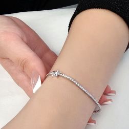 Photo of worn Diamonds Tennis Bracelet with sliding Star