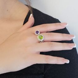 Photo of worn Open Design Ring with 9mm Peridot and 7mm Amethyst surrounded by Diamonds