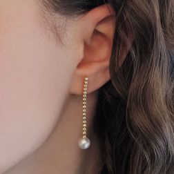 Photo of worn Yellow Gold Dangle Earrings with 34 Diamonds and Akoya Pearls