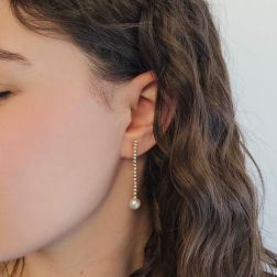 Photo of worn Yellow Gold Dangle Earrings with 34 Diamonds and Akoya Pearls