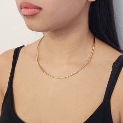 Photo of worn ‘Halo’ rigid necklace in yellow gold