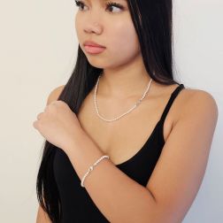 Photo of worn Freshwater Pearl Necklace with a Heart-Shaped Clasp in White Gold and Diamonds