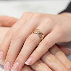 photo of worn Crossover Ring in Yellow Gold, Rose Gold and White Gold