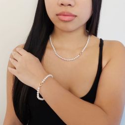 Photo of worn Freshwater pearl Bracelet with a round clasp in 18kt rose gold