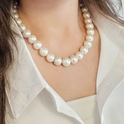 Photo of worn Freshwater pearl necklace with a Hidden Clasp in 18kt White Gold