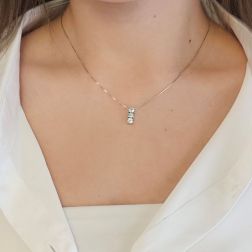 Photo of worn Trilogy Aquamarine Necklace (1.25 cm x 4.7 mm)