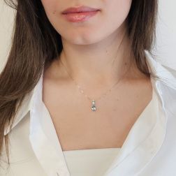 photo of worn Aquamarine teardrop necklace with 2 Diamond light points