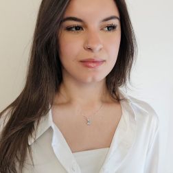 photo of worn Aquamarine teardrop necklace with 2 Diamond light points