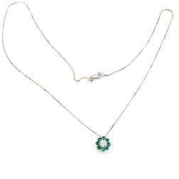 Necklace with a 9mm flower pendant with a 0.24ct GIA central diamond and emeralds