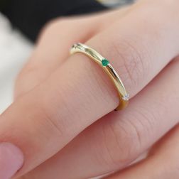 Photo of worn Thin Pyramid Band with Diamonds, Blue Sapphire, Ruby, Emerald on Yellow Gold