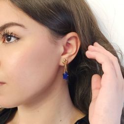 Photo of worn Yellow Gold Pendants with Blue Lapis Stars
