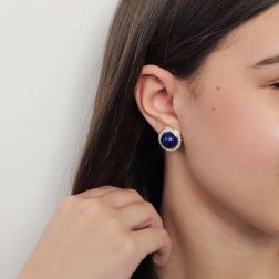 Photo of worn Round Cabochon Lapis earrings with a Diamond border Bi-colour