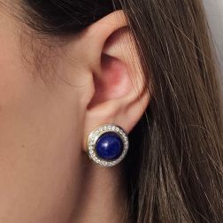 Photo of worn Round Cabochon Lapis earrings with a Diamond border Bi-colour
