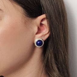 Photo of worn Round Cabochon Lapis earrings with a Diamond border Bi-colour