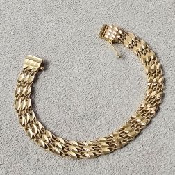 Bracciale a segmenti Foglioline Diamantate e Filo Torto in Oro Giallo