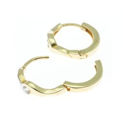 Wave small hoops in yellow and white gold