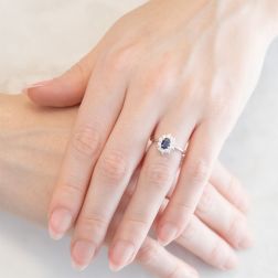Photo of worn Kate Small Sapphire Ring 6x4mm with 10 Diamonds