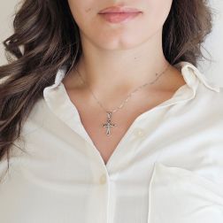 Photo of worn Gothic Cross Pendant in White Gold with Blue Sapphires