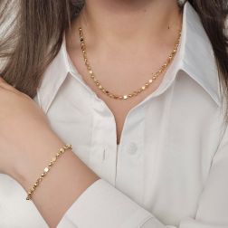 photo of worn Yellow Gold Bracelet with Cubes and Spheres