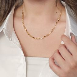 photo of worn Necklace with Cubes and Spheres in yellow gold