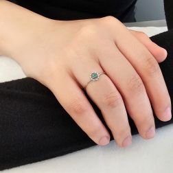 Photo of worn Easy Flower Emerald White Gold Solitaire Ring