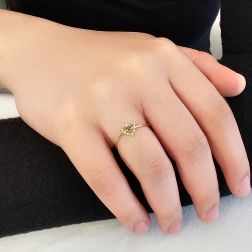 Photo of worn Easy Love Blue Sapphire Yellow Gold Solitaire Ring
