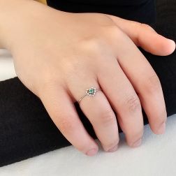 Photo of worn Easy Love Emerald White Gold Solitaire Ring