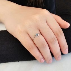Photo of worn Easy Love Blue Diamond White Gold Solitaire Ring