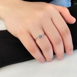 Photo of worn Easy Square Blue Sapphire White Gold Solitaire Ring