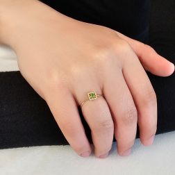 Photo of worn Easy Square Emerald Yellow Gold Solitaire Ring