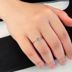 Photo of worn Easy Flower Blue Sapphire White Gold Solitaire Ring