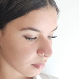 Photo of worn Hoops circles 1cm x 1mm in yellow gold