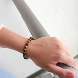 Photo of worn Elastic bracelet with 8.50mm Tiger's Eye beads