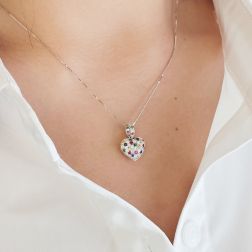 photo of worn Diamonds and Color Gems Pavè Rounded Heart Pendant