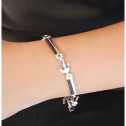 Photo of worn Segmented White Gold and Natural Rubber Bracelet with Anchors