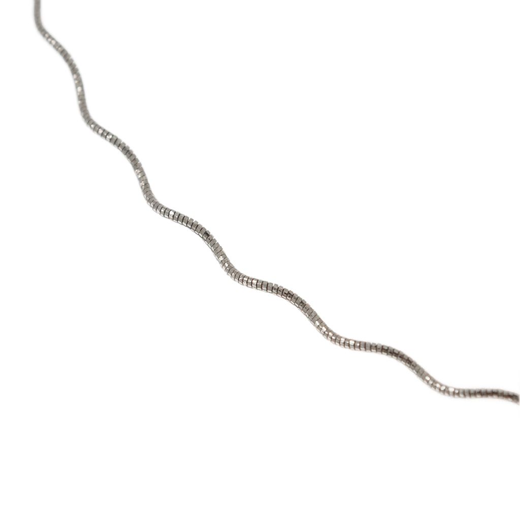 Wavy Semirigid flexible faceted necklace in white gold