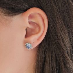 Photo of worn Flower Earrings with Aquamarine and Blue Sapphire in White Gold