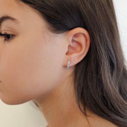 Photo of worn Trilogy Aquamarine and Diamond Hoops