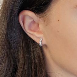 Photo of worn Trilogy Aquamarine and Diamond Hoops