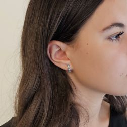 Photo of worn Trilogy Blue Diamond and Diamond hoops