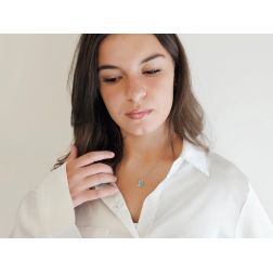 photo of worn White Gold Necklace with sky-blue enamelled Flower Pendant set with Diamonds