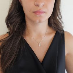 Photo of worn Scalar Trilogy Necklace in White Gold 4.4mm - 3mm