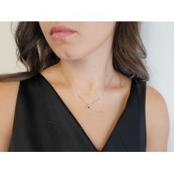 Photo of worn Light Point Ruby on Venetian Necklace Surrounded by White Gold - 7mm