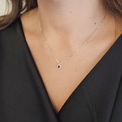Photo of worn Light Point Ruby on Venetian Necklace Surrounded by White Gold - 7mm