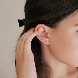 Photo of worn Single Aquamarine Stud Earring 4mm