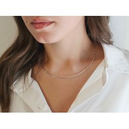 Photo of worn Rigid 18kt white gold necklace 1.5mm